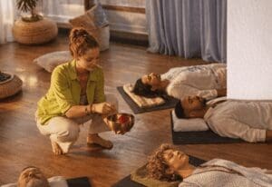 Sound healing session with relaxed participants.