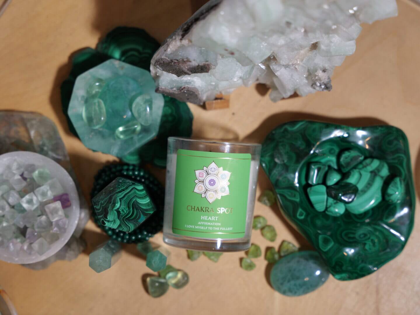 Green crystals and chakra candle display.