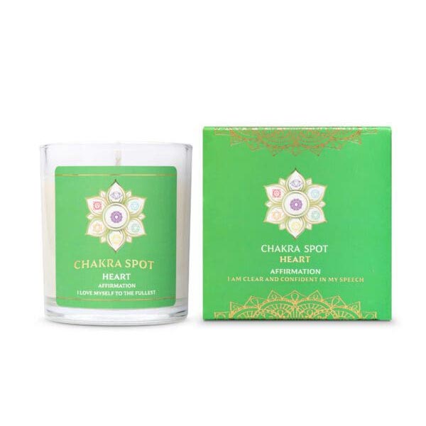 The Chakra Spot Heart candle is in a glass jar