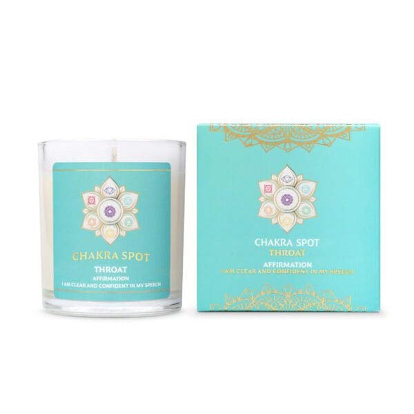 The Chakra Spot Throat candle is beside its turquoise gift box